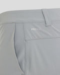 Close up of waistband on light gray NZC golf shorts showing PROTEK branding