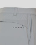 Close up of back pocket on pale gray NZC golf shorts with CASTORE logo