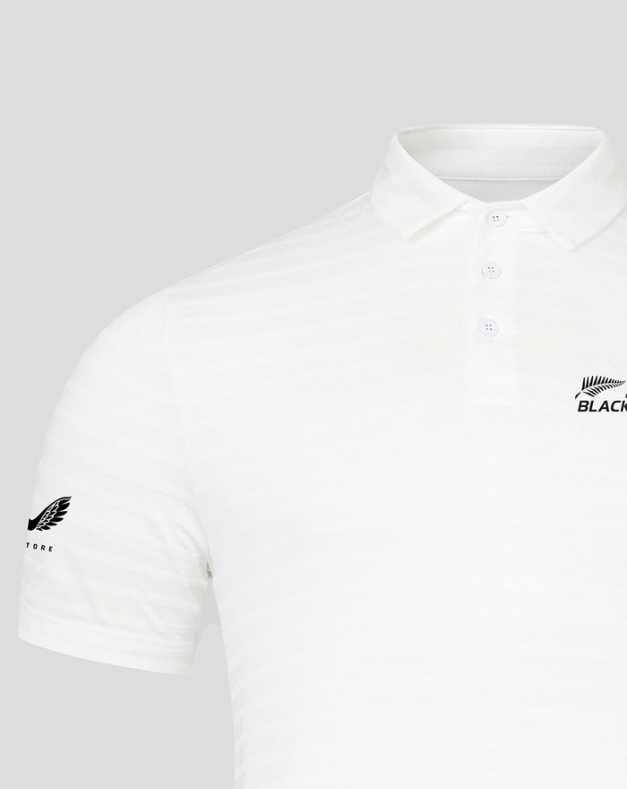 White NZC Pinnacle Stripe Golf Polo with faint stripes and Blackcaps logo on chest