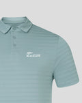 Light blue NZC Club Essential golf polo with subtle horizontal stripes and a white BlackCaps logo on the chest