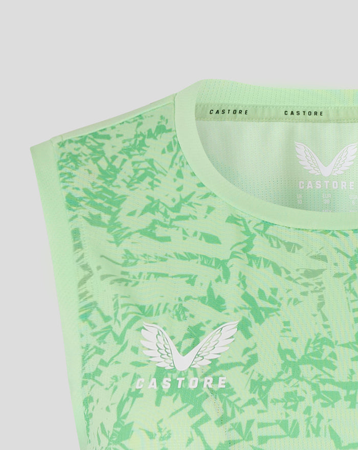 Mint green sleeveless training tee with abstract camouflage pattern and white winged Castore logo on front.