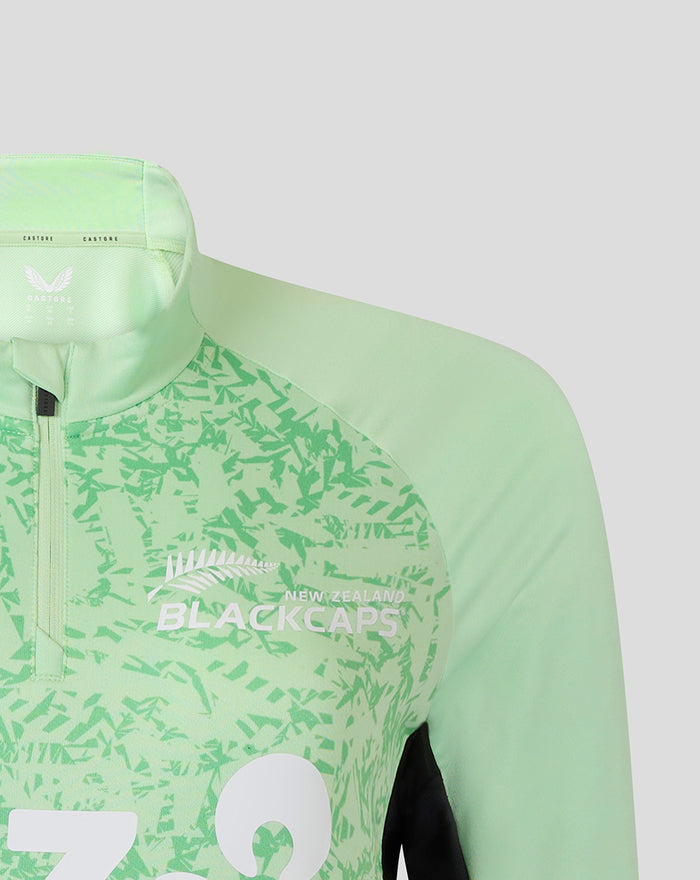 Mint green Womens 25/26 training midlayer top with abstract pattern and New Zealand Blackcaps logo on the chest.