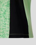 Close-up of mint green patterned panels and black side panel on the Womens 25/26 Training Short Sleeve T-Shirt