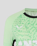 Mint green womens training short sleeve T shirt with abstract leaf pattern and white wing emblem on the chest