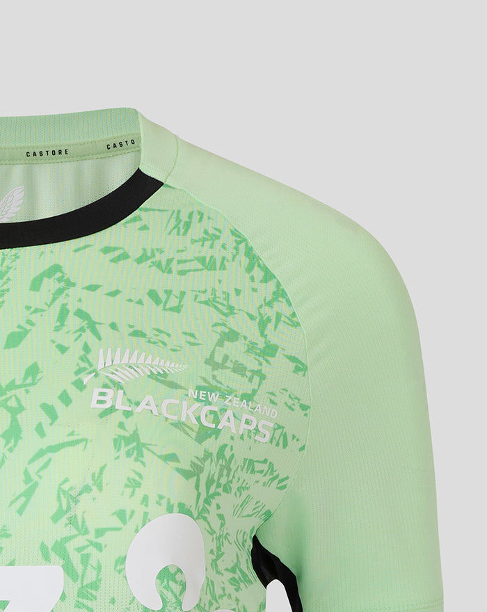 Mint green training short sleeve shirt showing shoulder pattern and New Zealand Black Caps logo on the chest