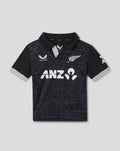 Front view of an infant black patterned short sleeve shirt with a large white logo