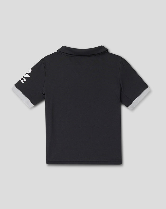 Back view of Infant ODI 25/26 Short Sleeve Shirt in black with light gray sleeve cuffs.