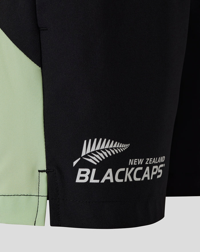 Black shorts with white BLACKCAPS fern logo on the leg.