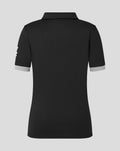 Back view of black short sleeve polo style shirt with light gray cuff trim