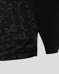 Close up of black patterned fabric on the Junior ODI short sleeve shirt near the hem