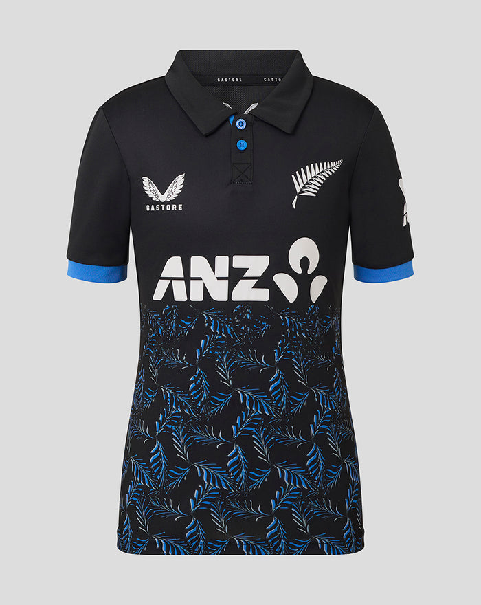 Front view of junior T20 shirt with ANZ logo and blue fern pattern at the hem and blue sleeve cuffs