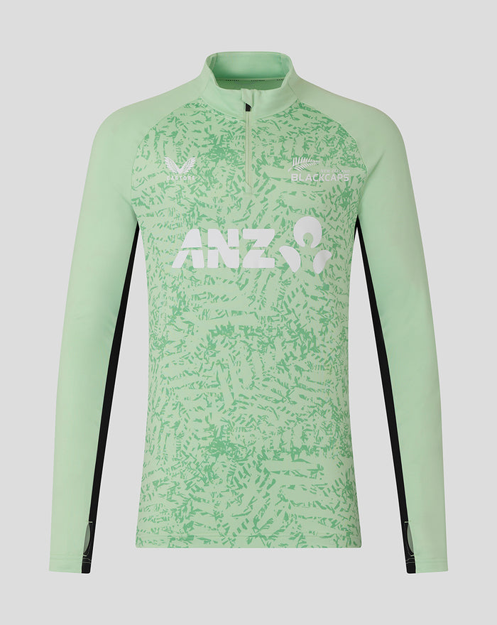Mint green long sleeve training midlayer with abstract pattern and large ANZ logo across the chest