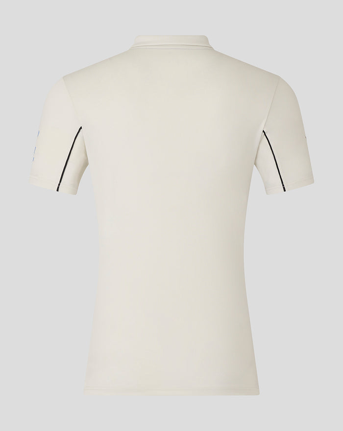 Back view of a cream short sleeve polo shirt with a neat collar.