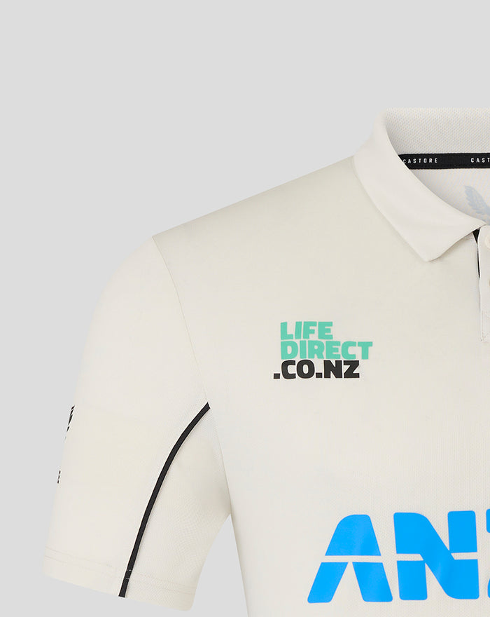 Close-up of white polo collar and chest logos on Mens 25/26 Test Short Sleeve Shirt